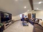 Basement Family room with 55` TV, Wii and ping pong table